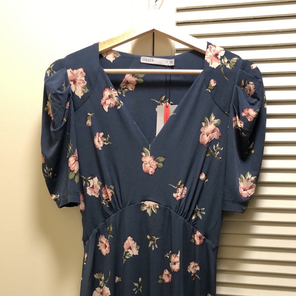 V-neck floral midi dress with ruched sleeves. New with tag. - Picture 2 of 3